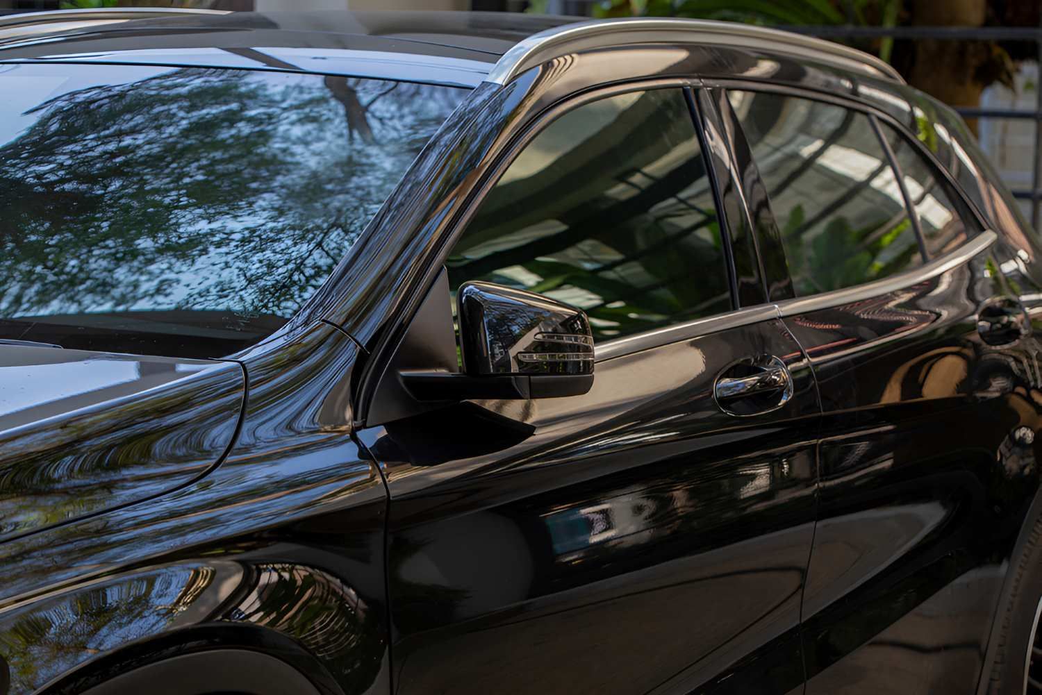 A Close Up of a Black Car Parked in a Parking Lot — C J Mechanical In Berry, NSW