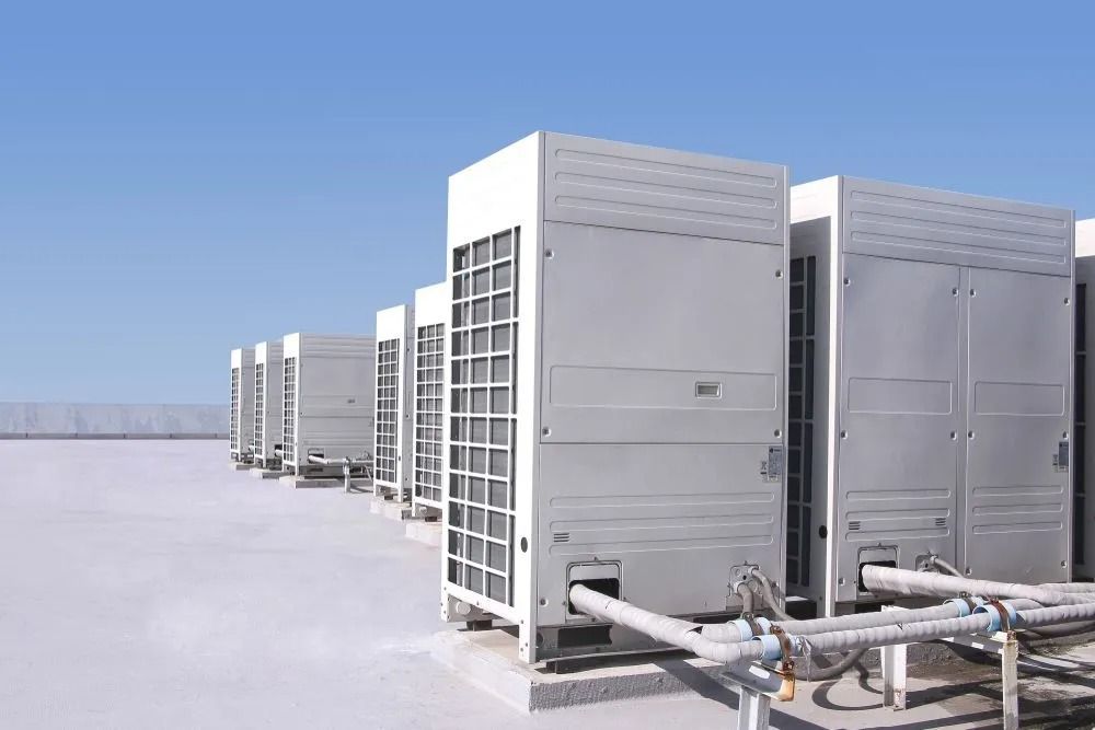 Row of Large, White Air Conditioning Units — Climate King In Orange, NSW