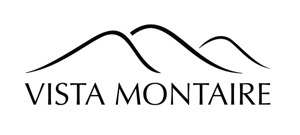 Logo for Vista Montaire, featuring three stylized mountain peaks above the words