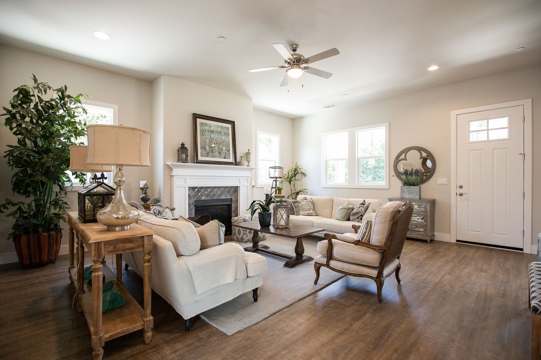A living room filled with furniture and a fireplace.
