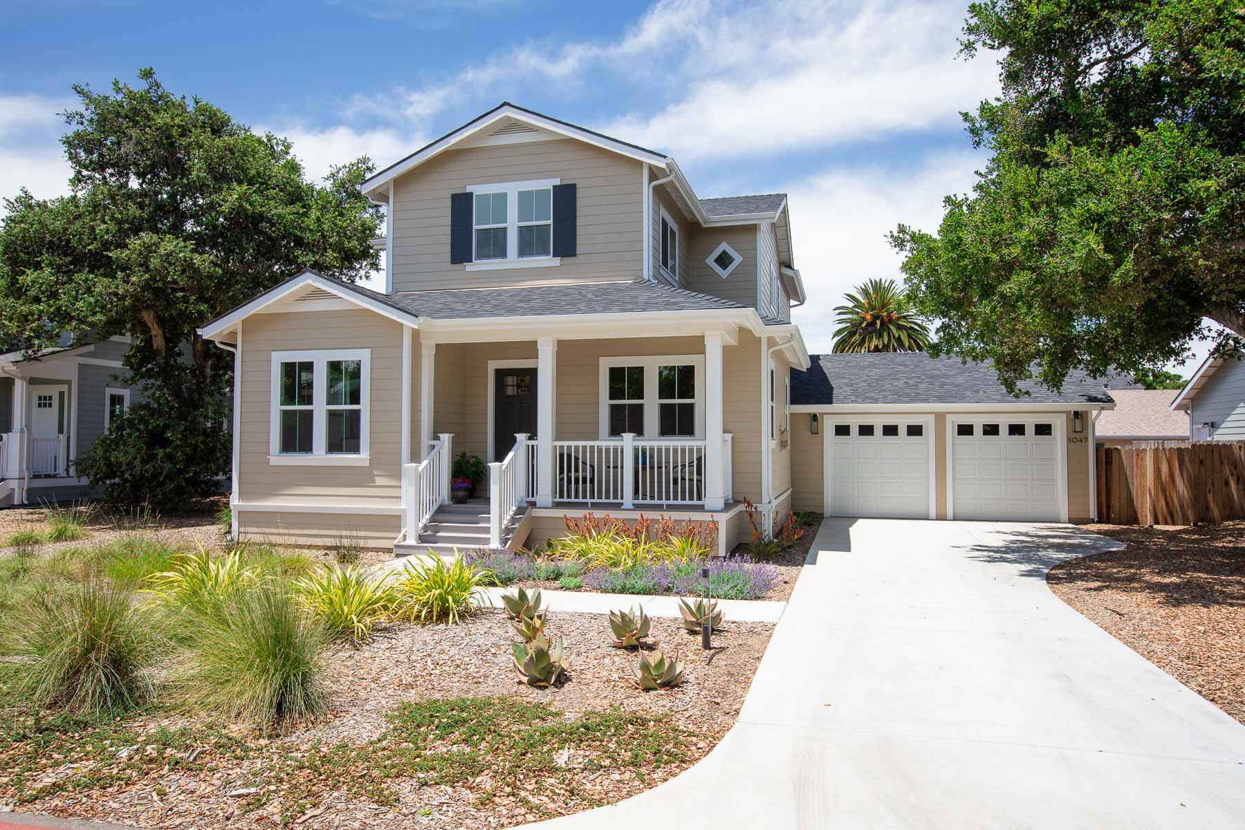 The front of a house with a driveway and a garage