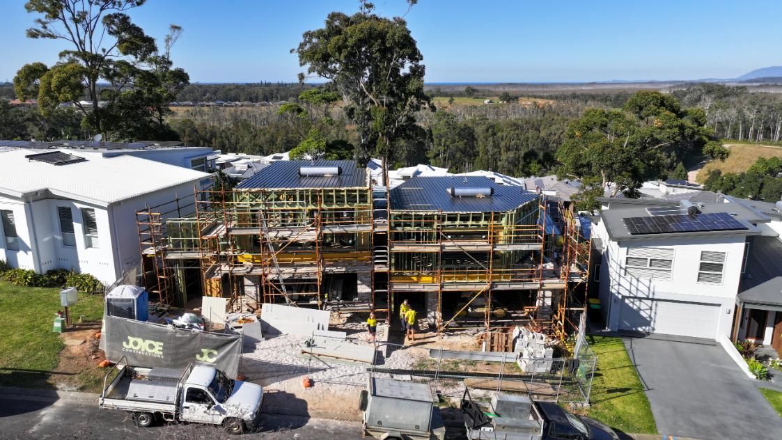 An Aerial View of a House Under Construction in a Residential Area — Roofing Contractor in Forster, NSW