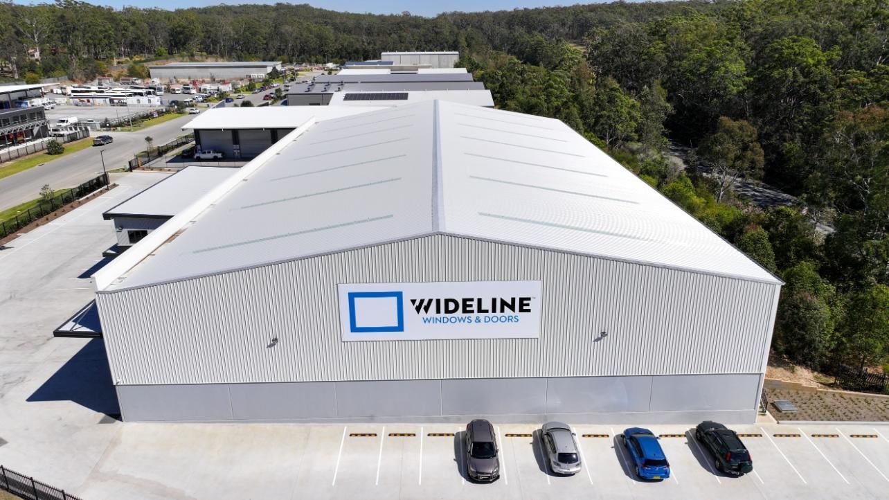 An Aerial View of a House Under Construction in a Residential Area — Roofing Contractor in Wauchope, NSW