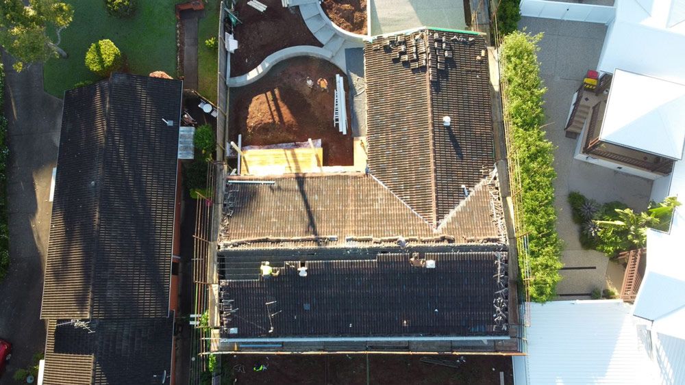 Before repairing a Roof aerial view — Roofing Contractor in Wauchope, NSW