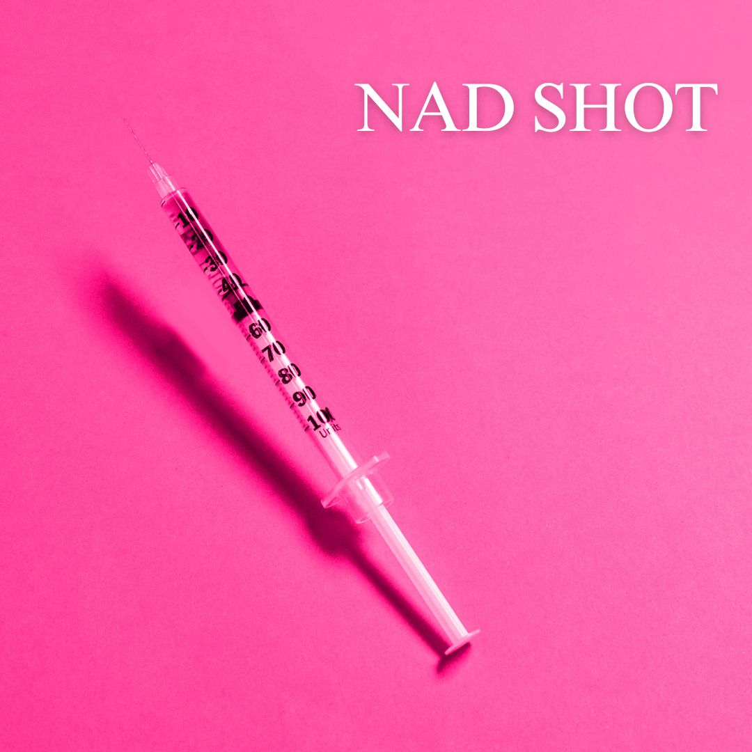 A syringe on a pink background with the words nad shot