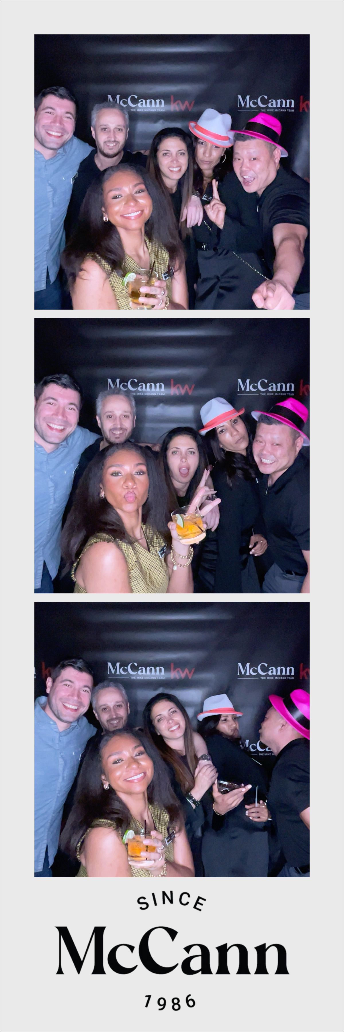 A custom photo strip of people posing for a picture in front of a photo booth by Empower Event Group.