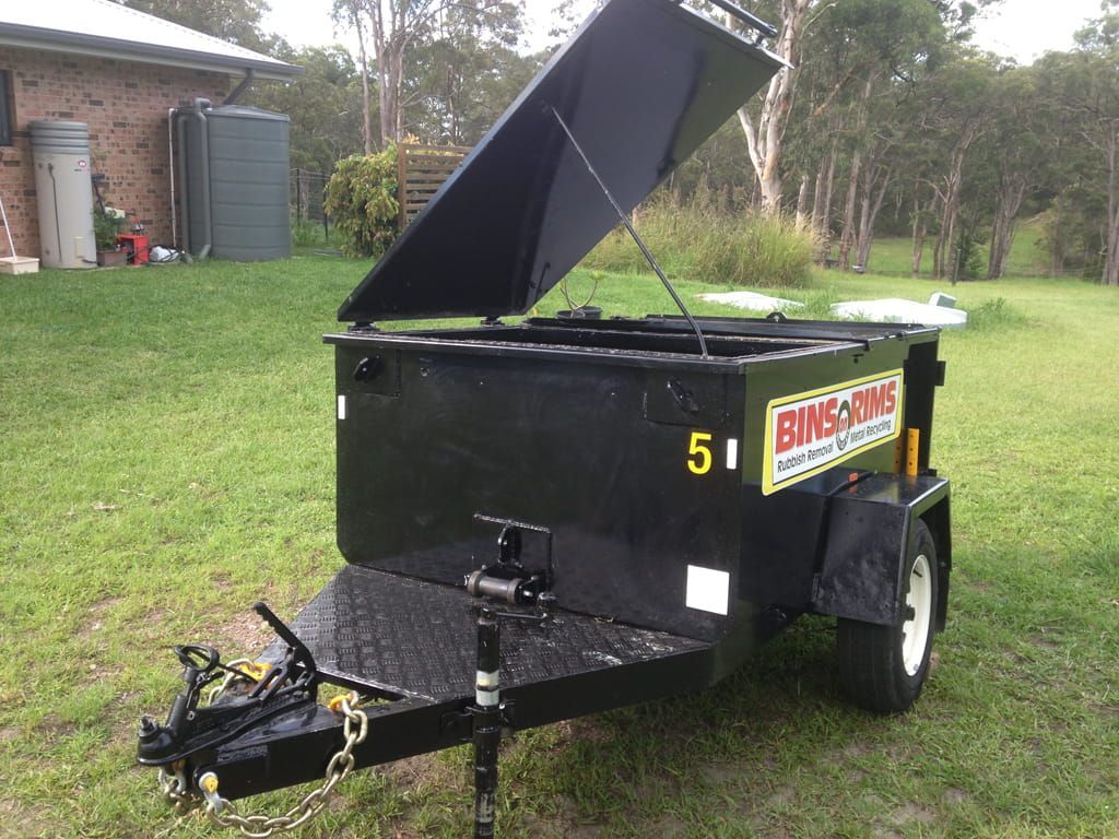 A black trailer with the number 5 on it — Bins on Rims in Kempsey, NSW