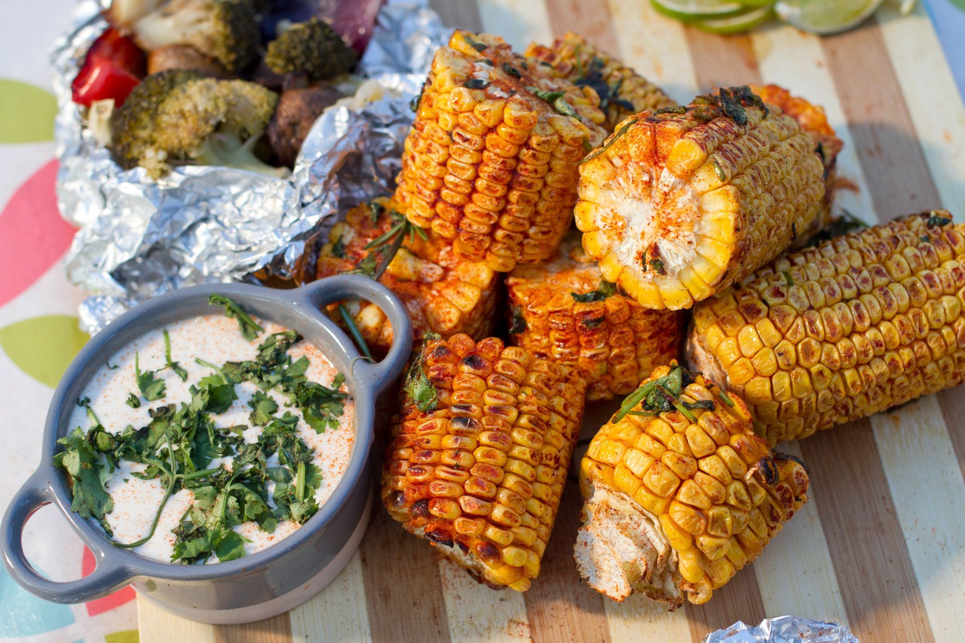 Grilled corn and vegetables with a creamy dip.