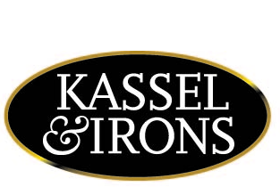 Kassel & Irons logo: White text on a black oval with a gold border.