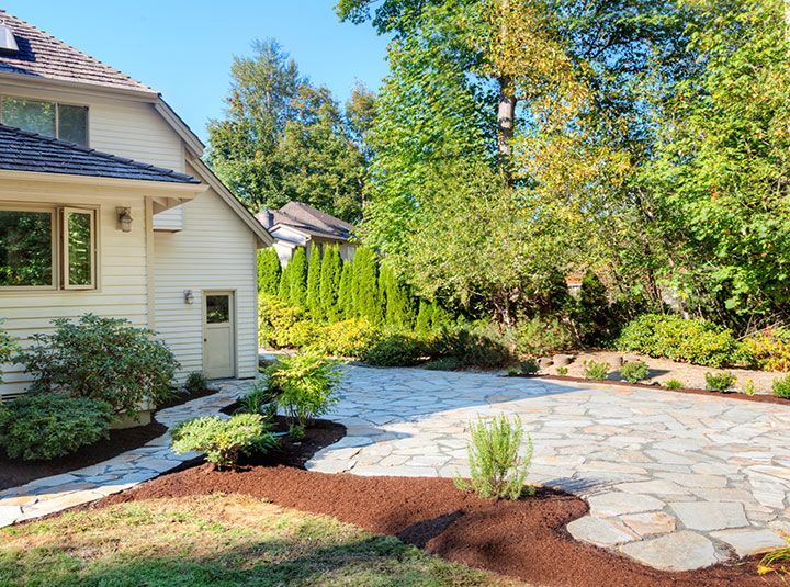 atio and flowerbeds complete