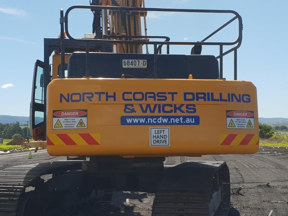 The back of a truck with North Coast Drilling and Wicks branding— North Coast Drilling & Wicks in Bangalow, NSW