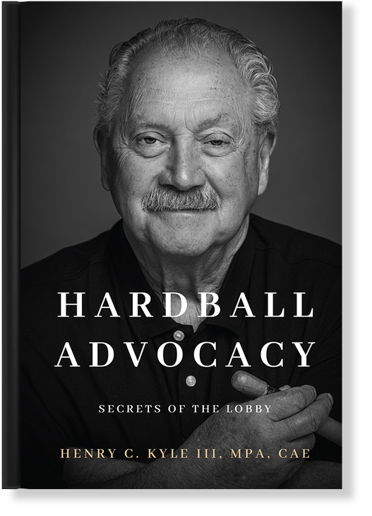 Book cover with a grayscale portrait of an older man with a mustache. Text reads