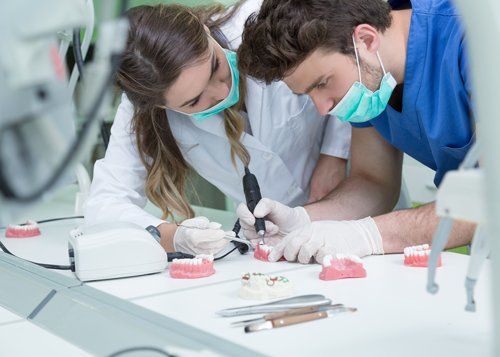 Dentures — Dentists While Working on The Denture in Jasper, IN