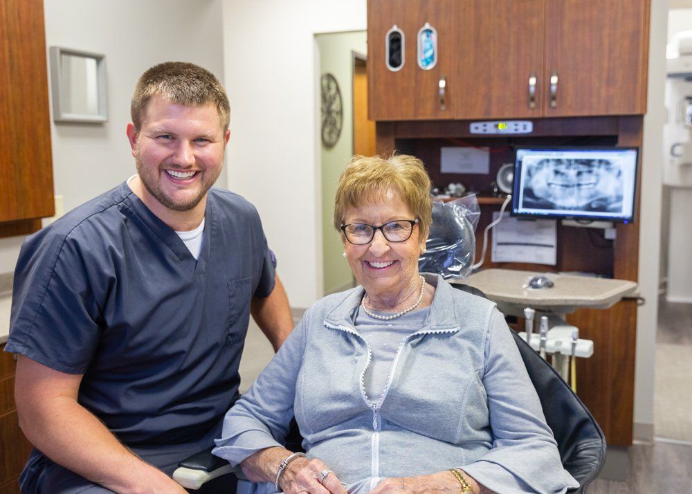 Holistic Dental Care — Dr. Giesler with Patient in Jasper, IN