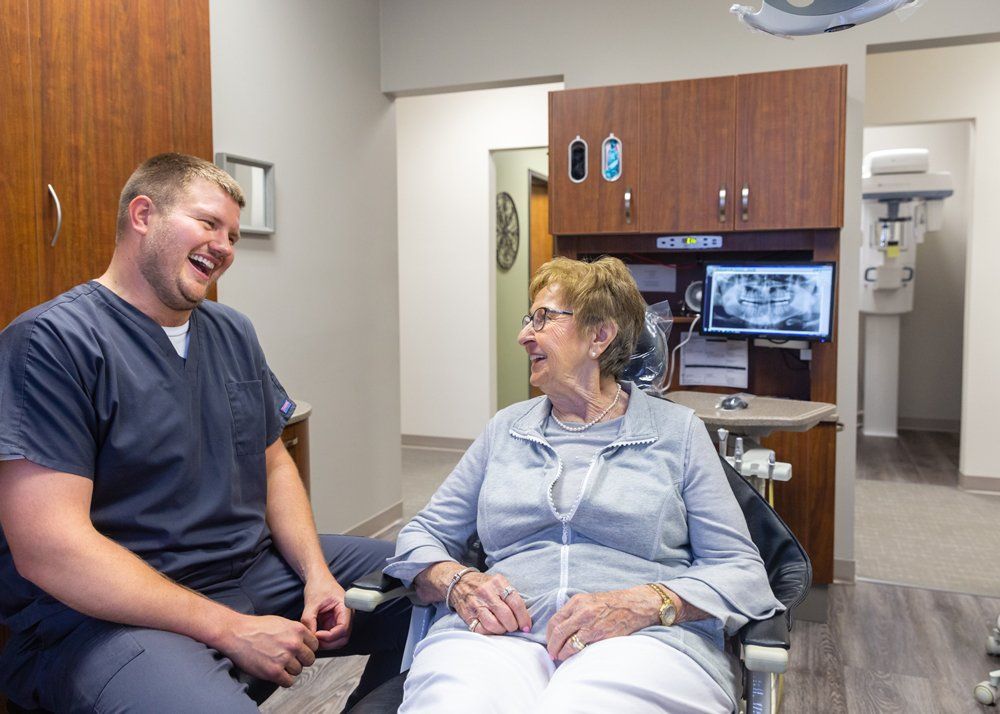 Biological Dentistry — Dentist and Old Patient in Having a Talk in Jasper, IN