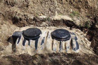 Septic tank in ground - B & B Sewer & Septic Tank Service
