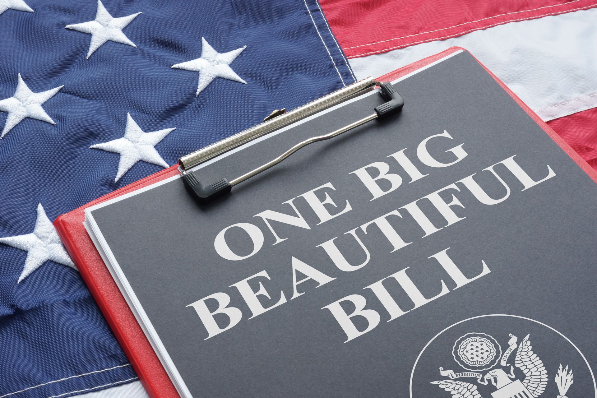 A clipboard with the words one big beautiful bill written on it