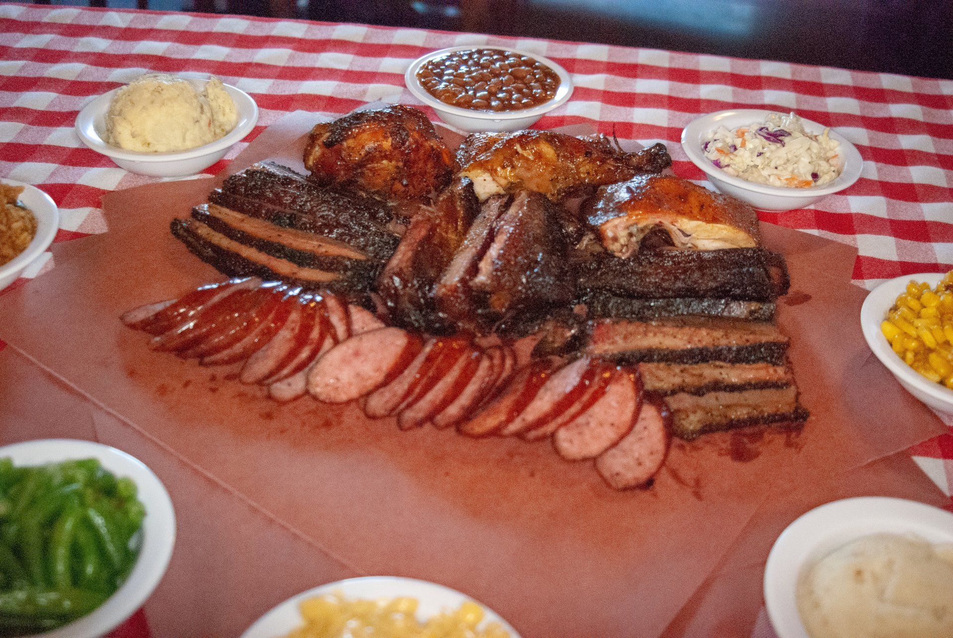 Barbecue variety with cose slaw, corn and mashed potatoes sides
