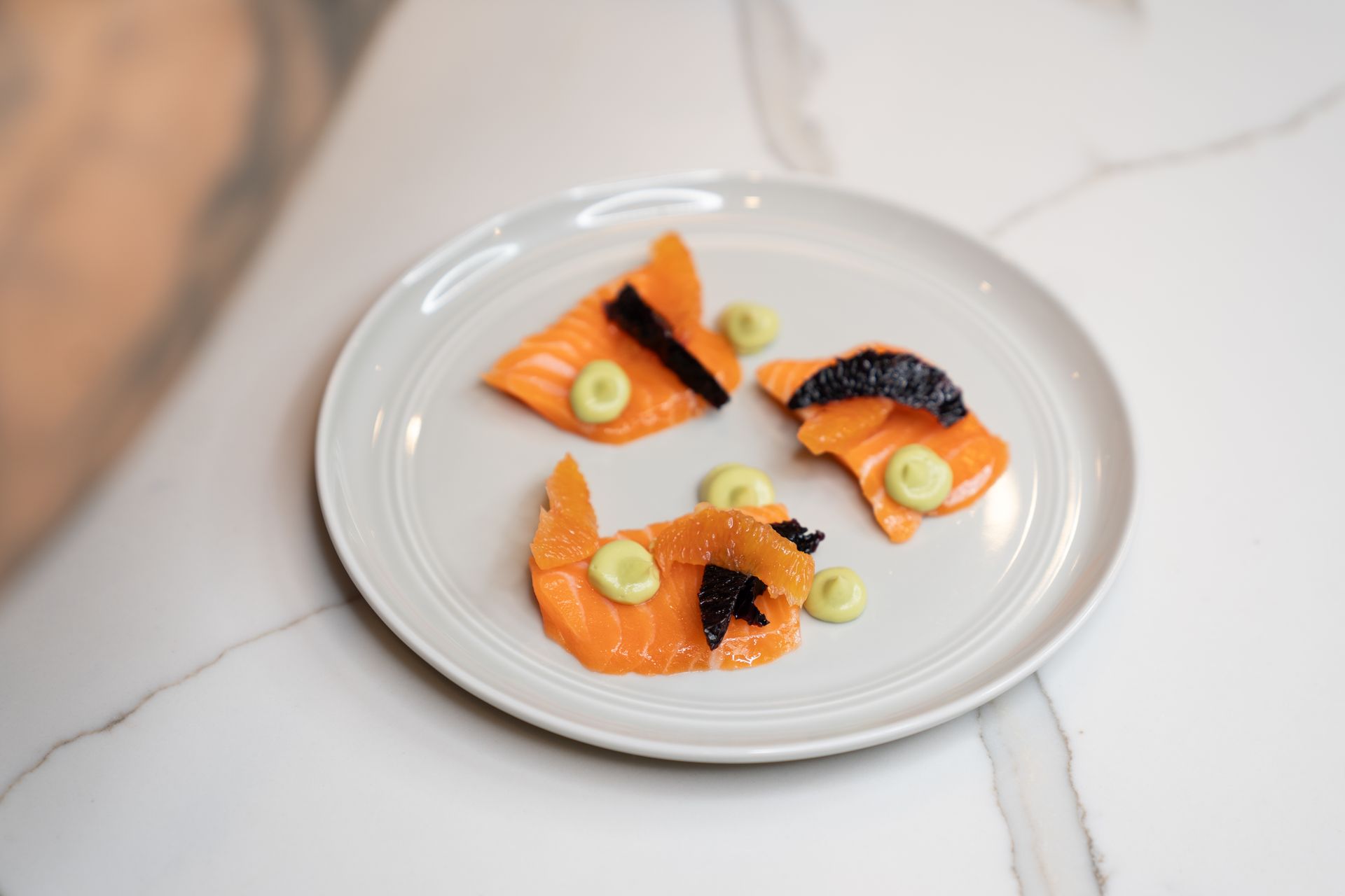 A close up of a plate of food on a table.