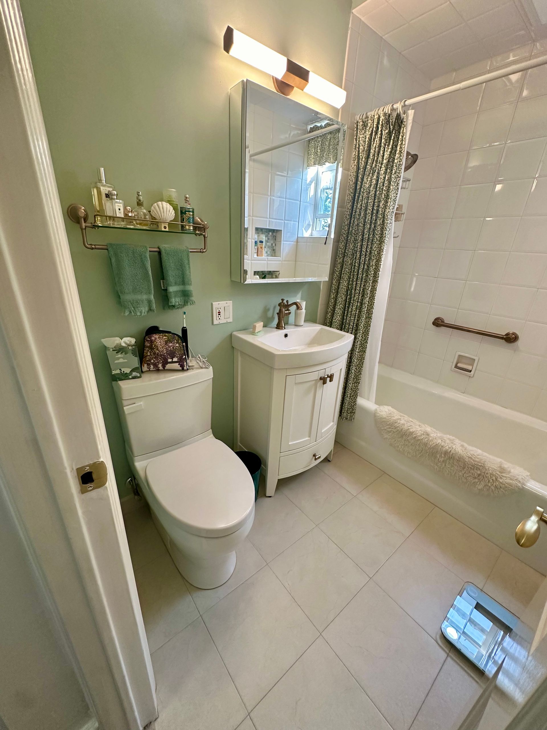 A house with a porch and stairs leading up to it