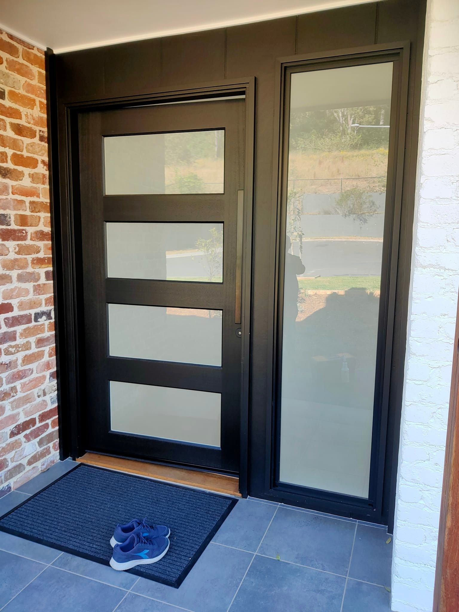 A Door With Frosted Windows — Sunblitz Window Tinting In Kiama, NSW