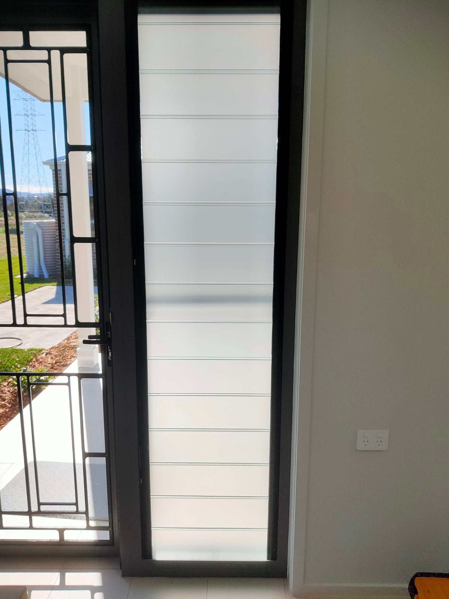 Frosted Window In A Door In A House — Sunblitz Window Tinting In Thirroul, NSW
