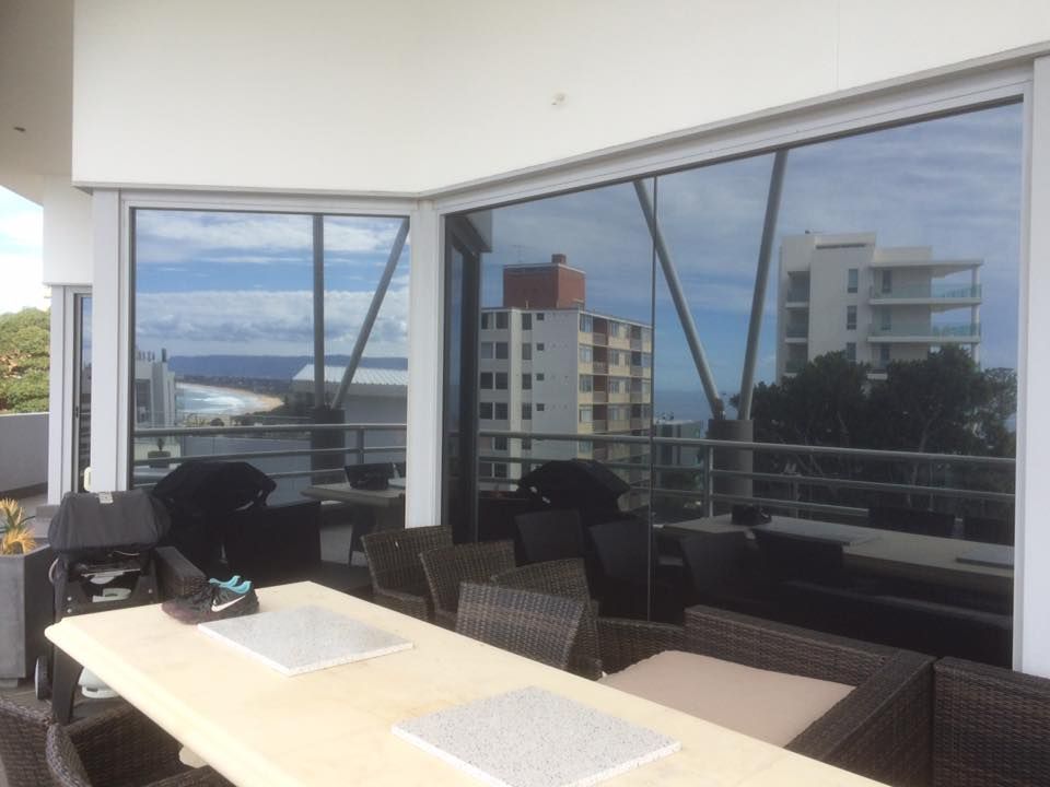 A Tinted Window On A Balcony — Sunblitz Window Tinting In Shellharbour, NSW