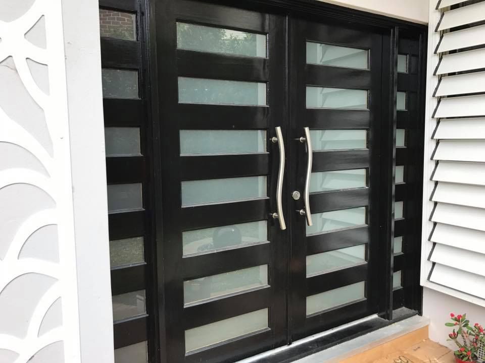 A Front Door With Frosted Windows— Sunblitz Window Tinting In Dapto, NSW