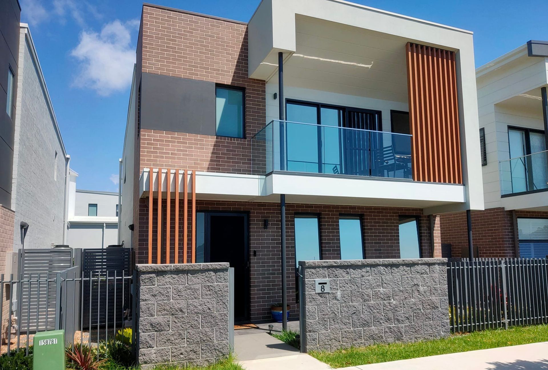 Tinted Windows On A Residential Building — Sunblitz Window Tinting In Dapto, NSW