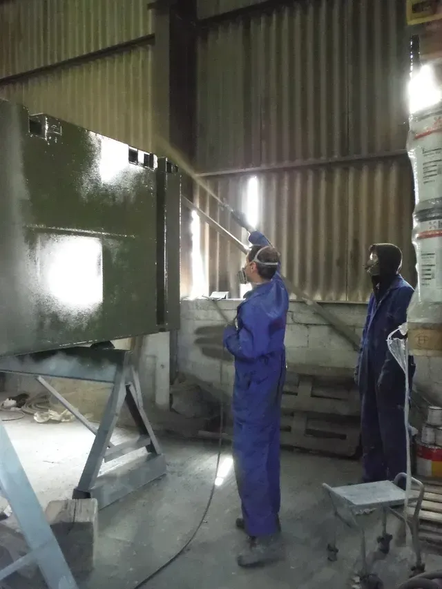 painting a section of the ship