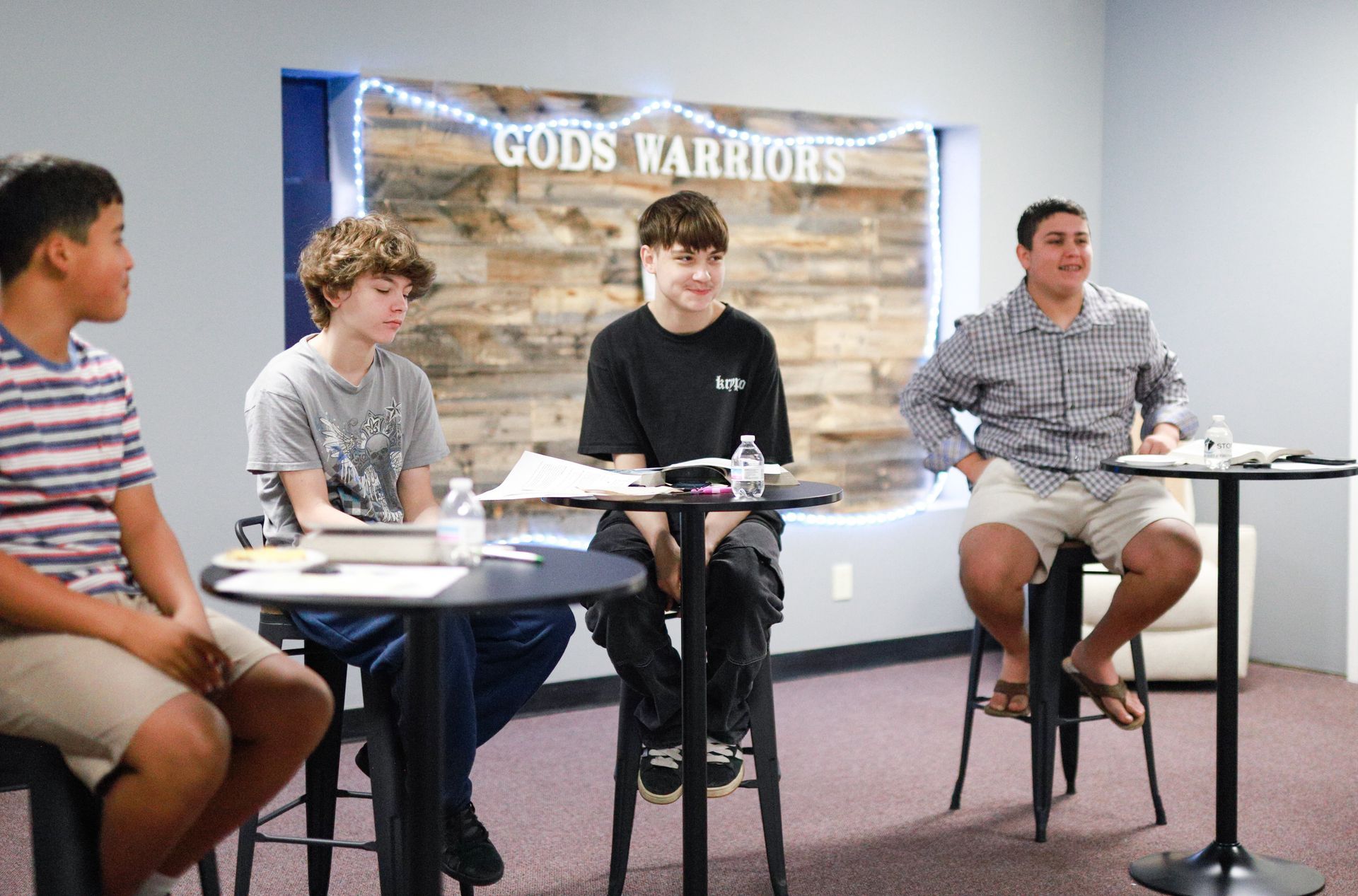 Two young boys are posing for a picture together
