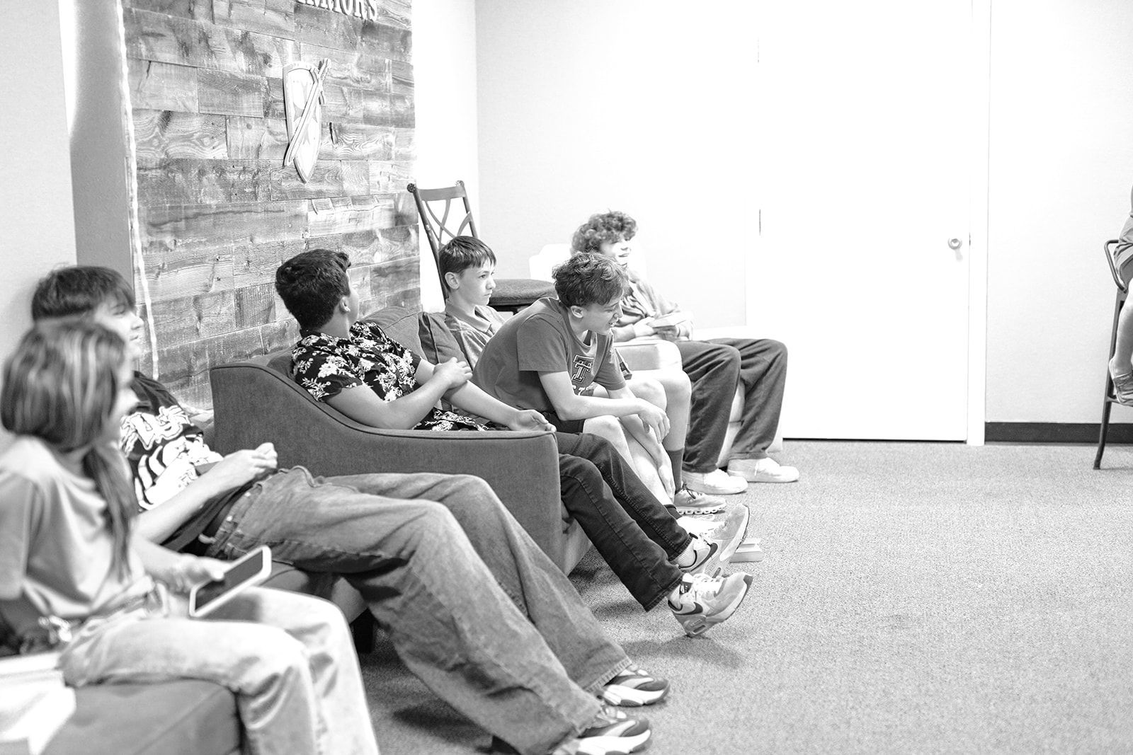 Two young boys are posing for a picture together