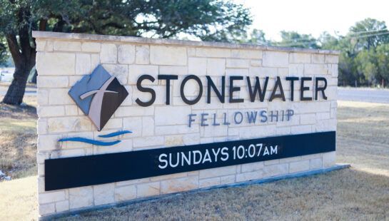 A sign for stonewater fellowship says sundays 10:00 am