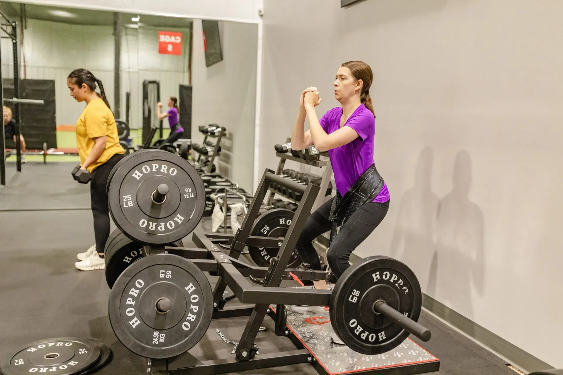 4:8 Physio clients building strength in the gym