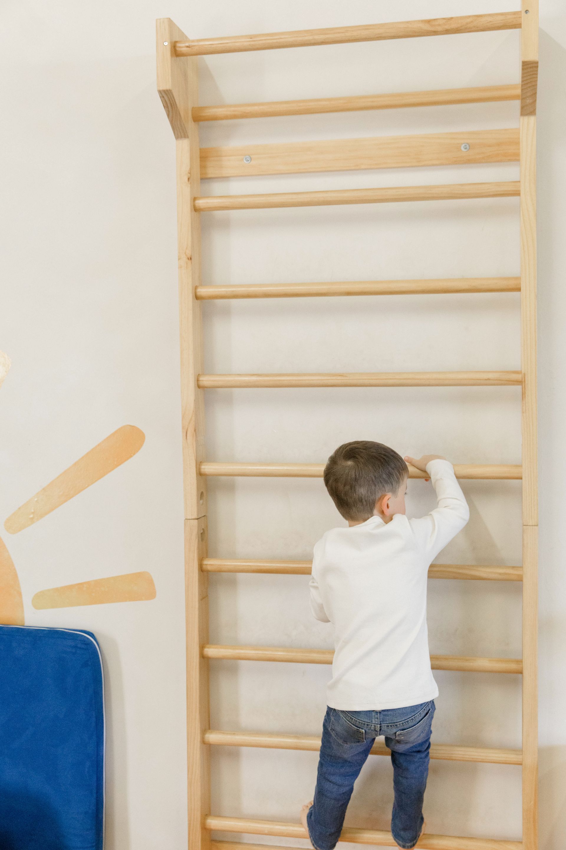 A child playing in the childcare area at 4:8 Physio