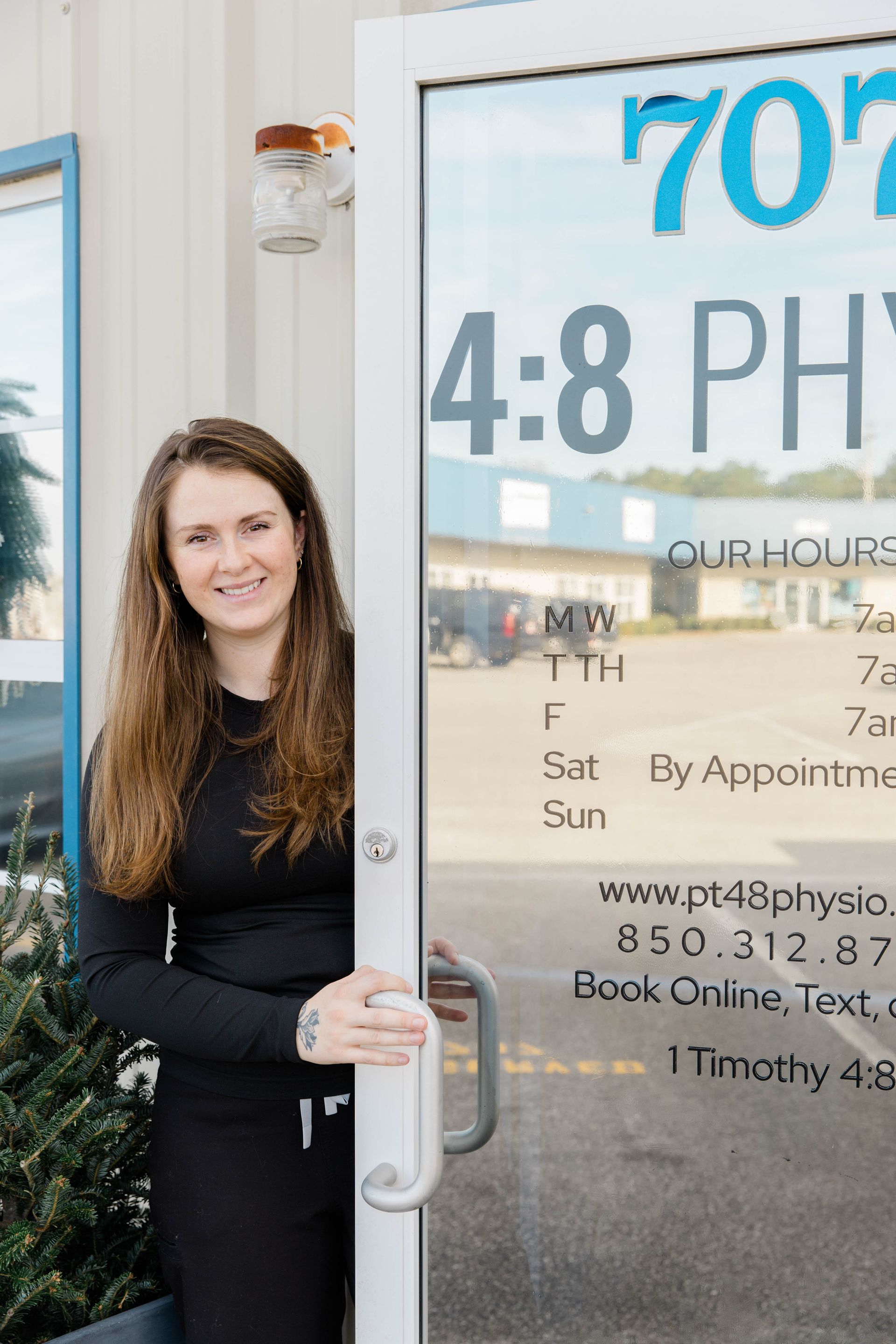 Dr. Molly Gray welcoming patients to 4:8 Physio in Crestview