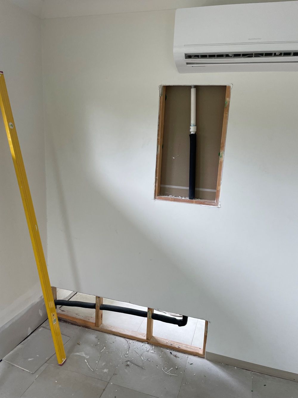 A Room Under Construction With A Hole In The Wall — FNQ Maintenance Services In Parramatta Park, QLD 