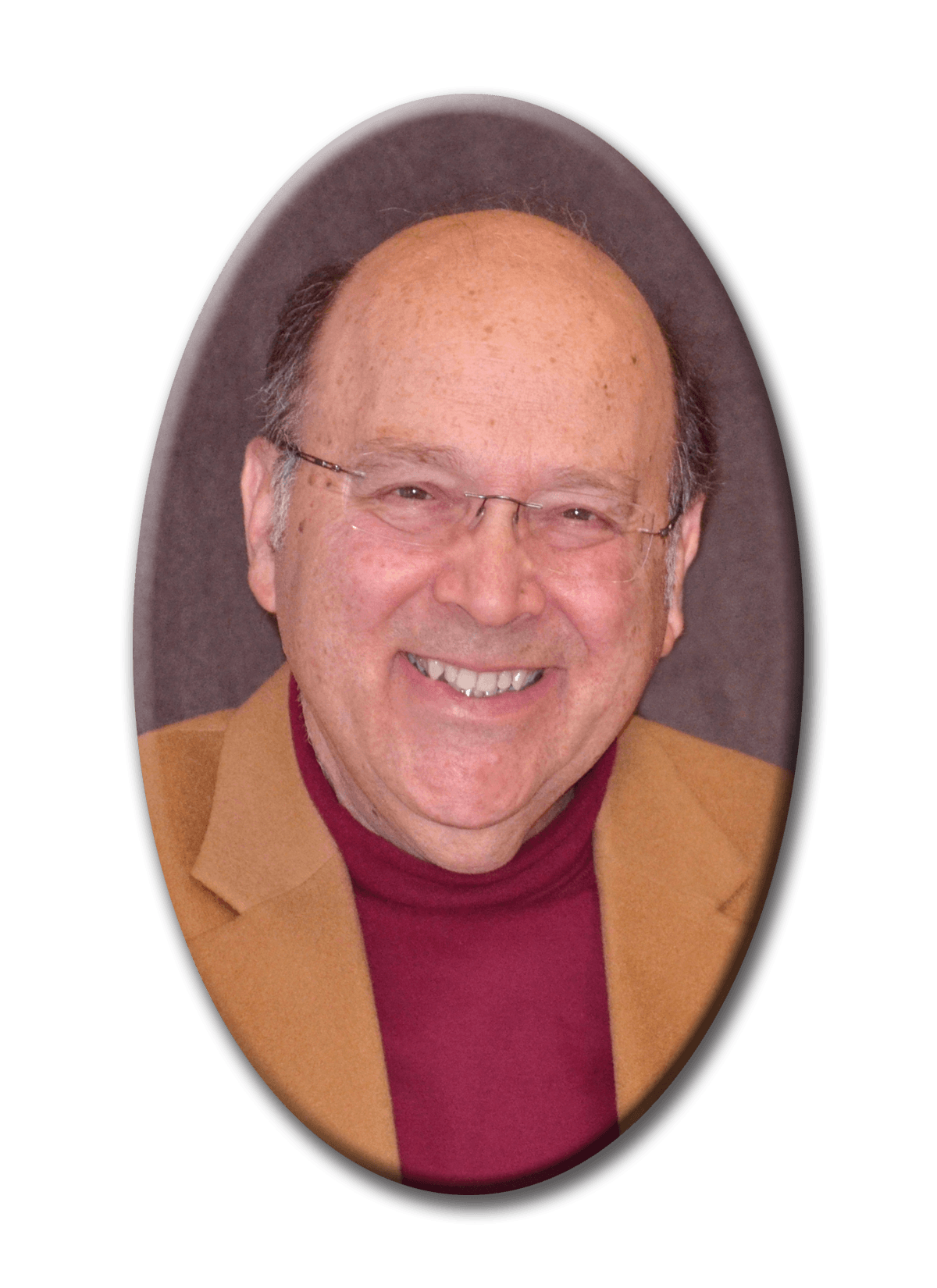 A man wearing glasses and a brown jacket is smiling in an oval photo A man wearing glasses and a brown jacket is smiling in an oval photo