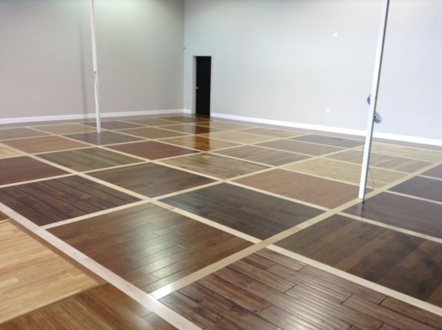 A room with many different types of wood floors