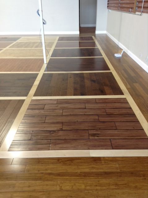 A room with many different types of wood floors
