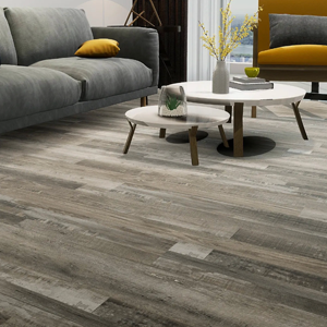 A living room with a couch and two coffee tables