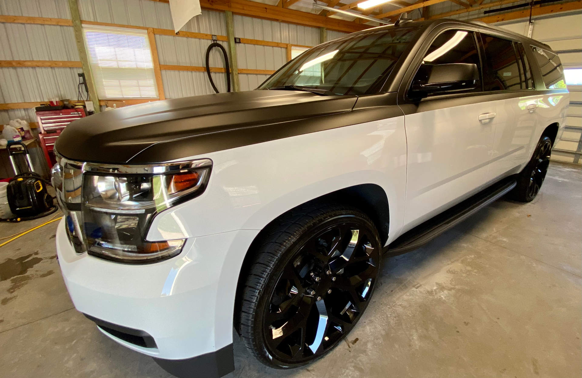 black and white suburban after a service at EG Automotive Detailing