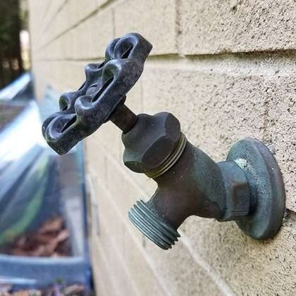 Outdoor faucet with a hose thread and wheel handle Showing No Backflow prevention.