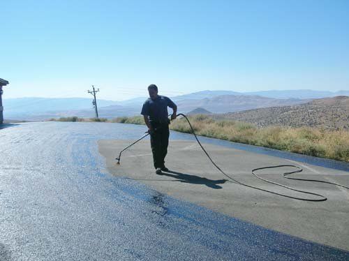 Residential— Worker Putting Seal on Pavement in Sparks, NV