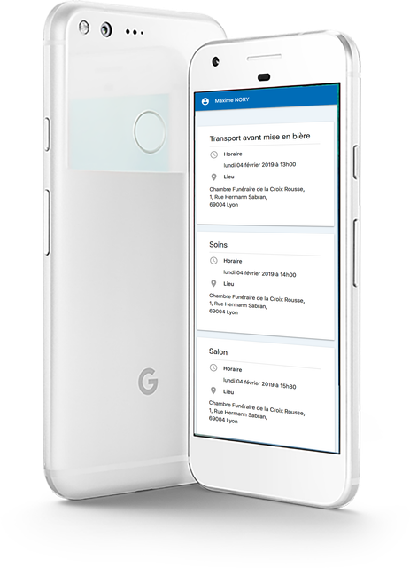 Un téléphone Google Pixel blanc est posé sur une surface blanche.