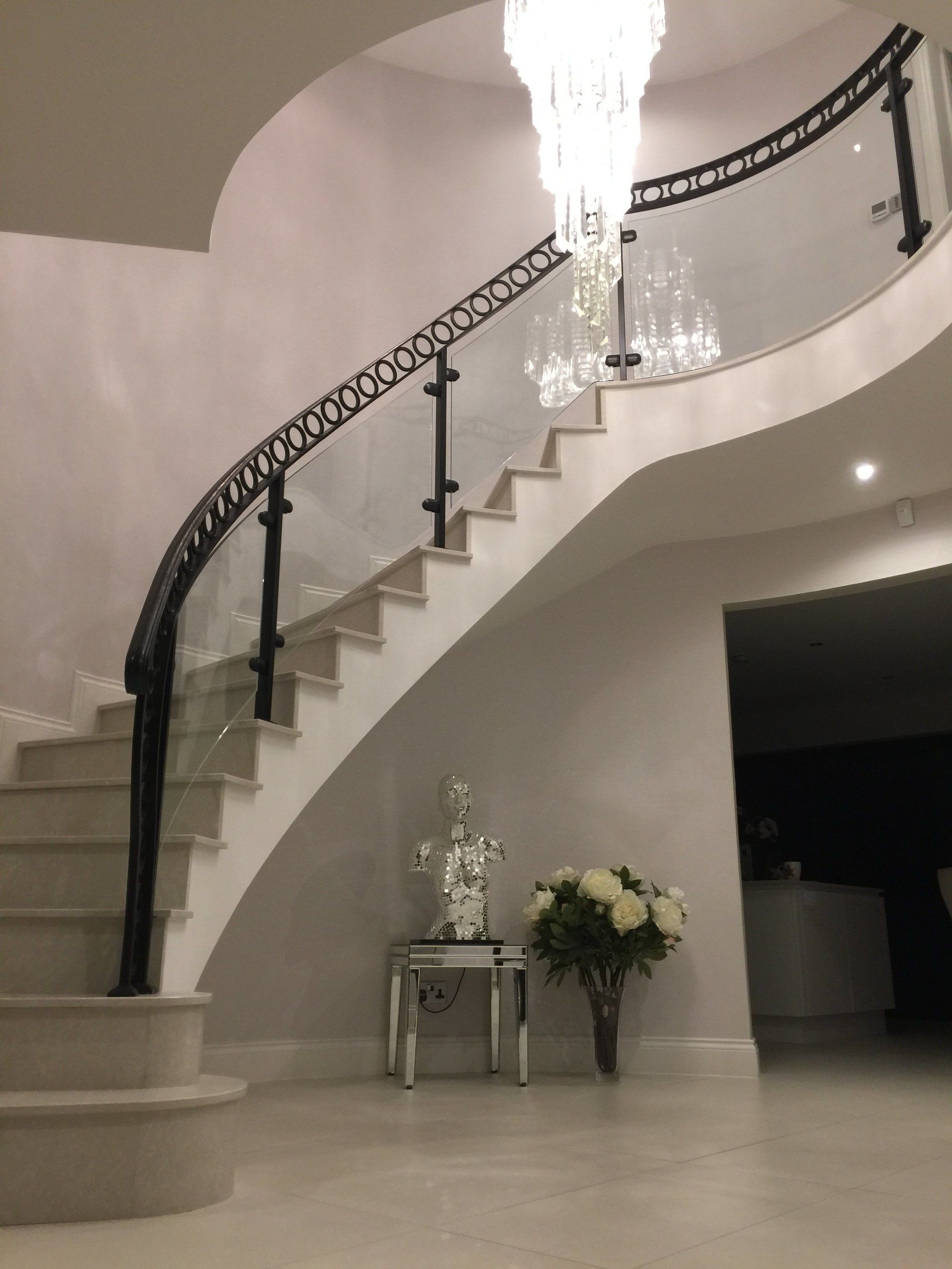 Cantilevered solid stone staircase.