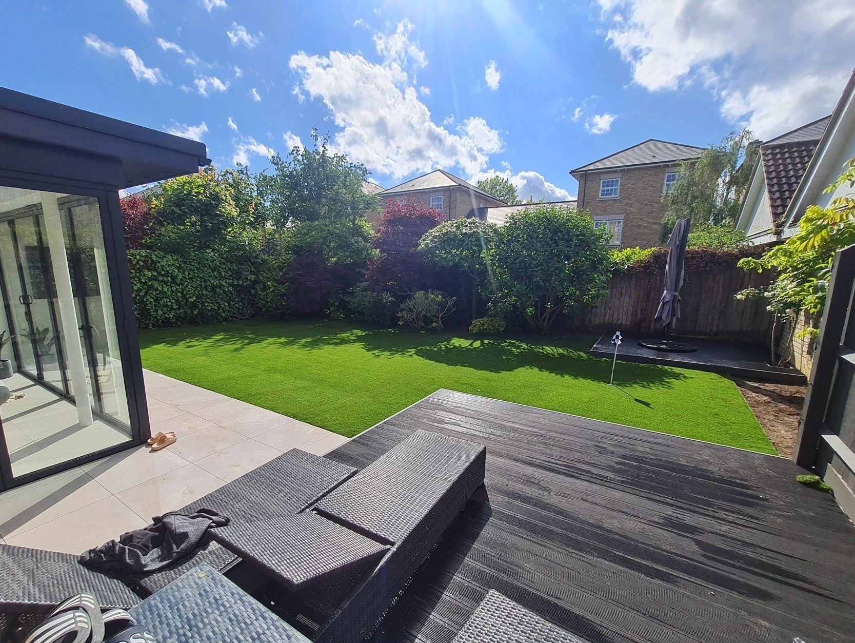 Landscaped garden with artificial grass lawn in Suffolk, we also cover Norfolk, Essex, Cambridgeshire and Hertfordshire.