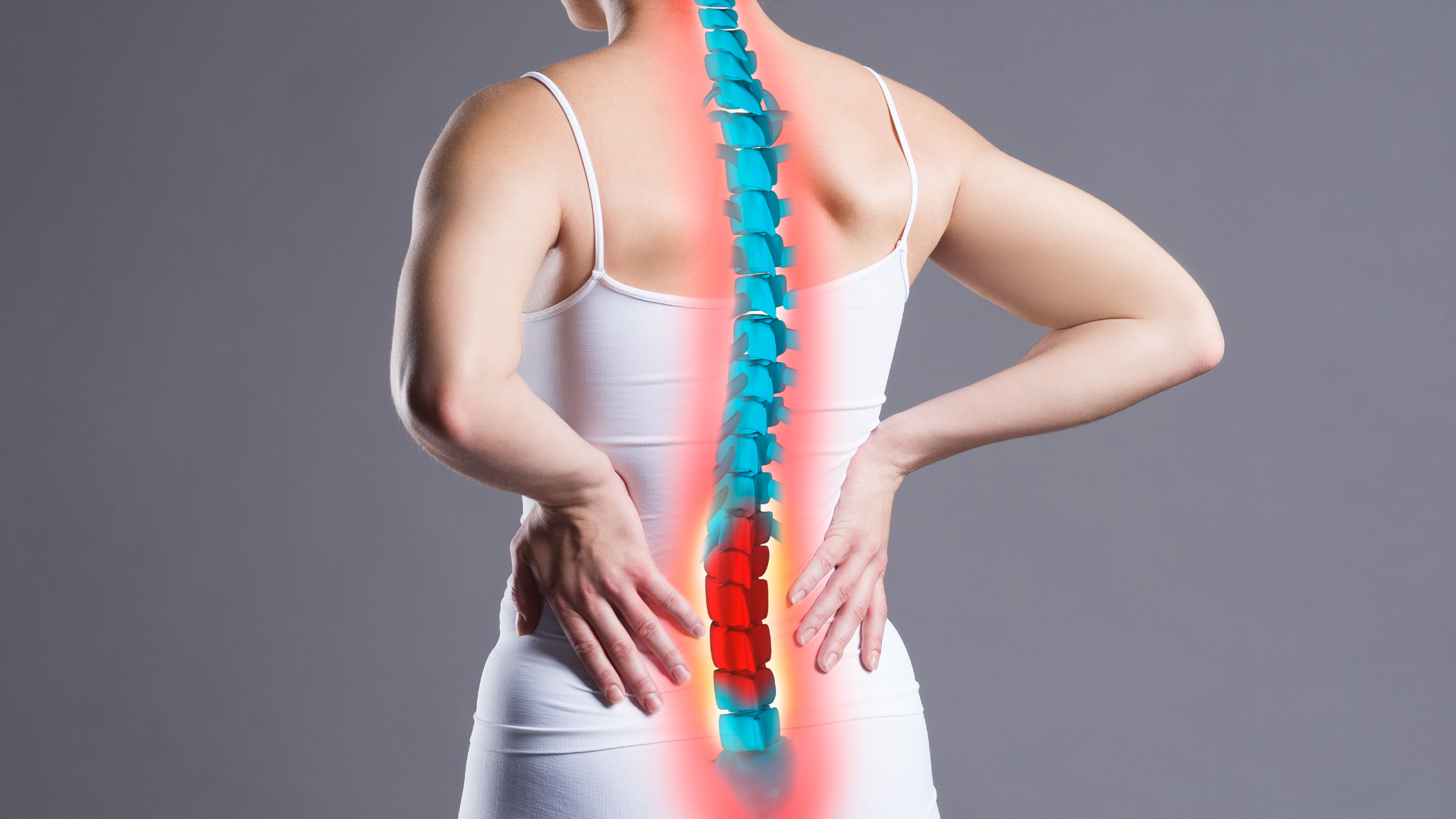 Woman holding back, spine highlighted with red and blue.