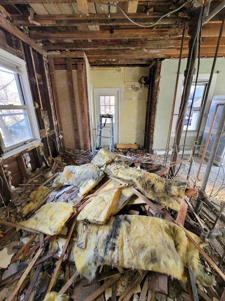 A room with a lot of wood and insulation in it