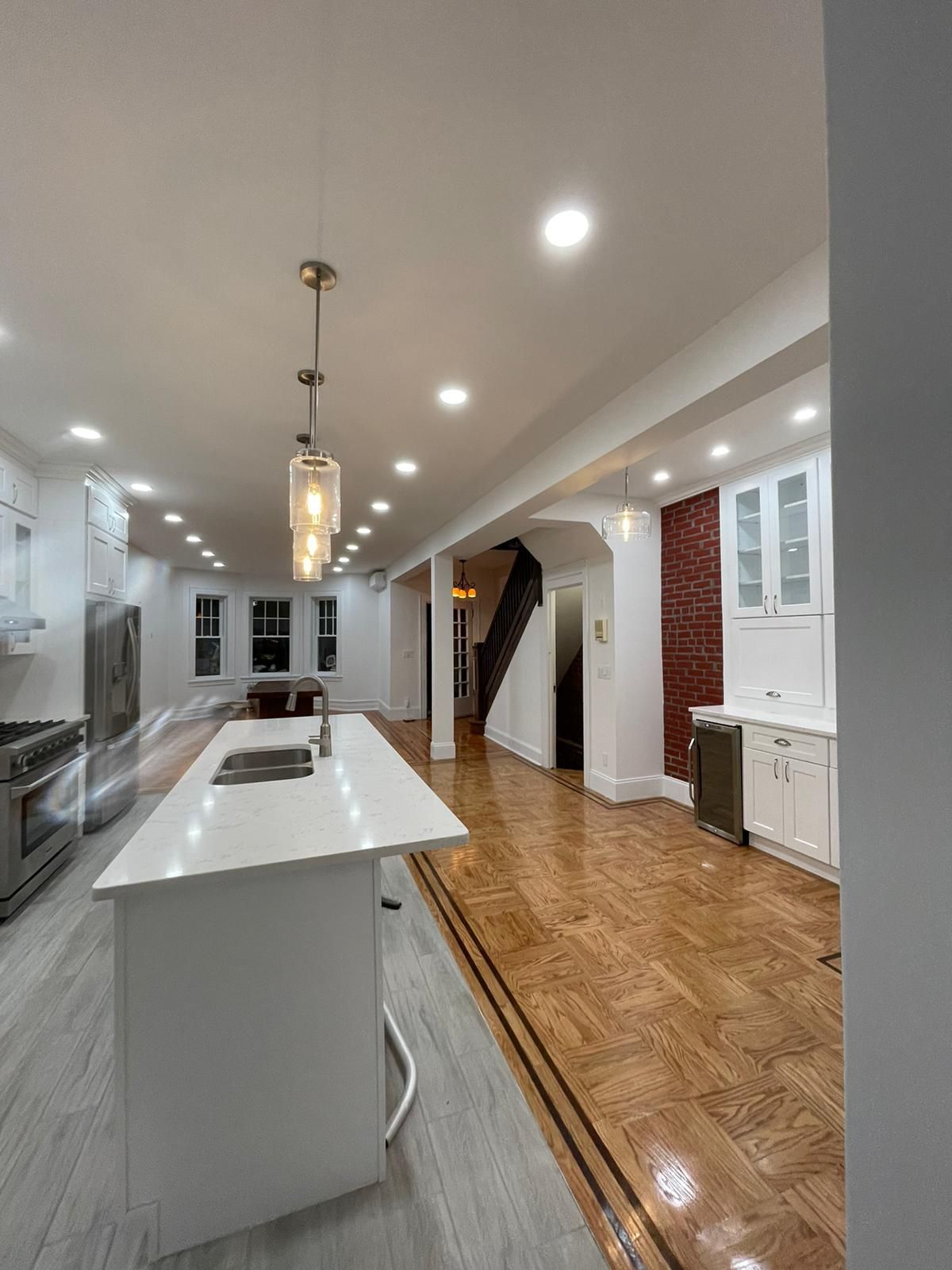 There is a large island in the middle of the kitchen
